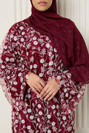 Inès Abaya in Deep Red