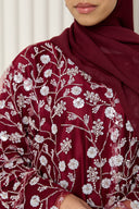 Inès Abaya in Deep Red