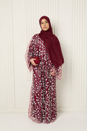 Inès Abaya in Deep Red